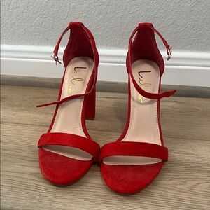 Lulu's sz 7 ~4inch Red Heels - only worn around the house, basically brand new.